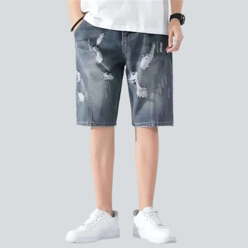 Loose men's ripped denim shorts