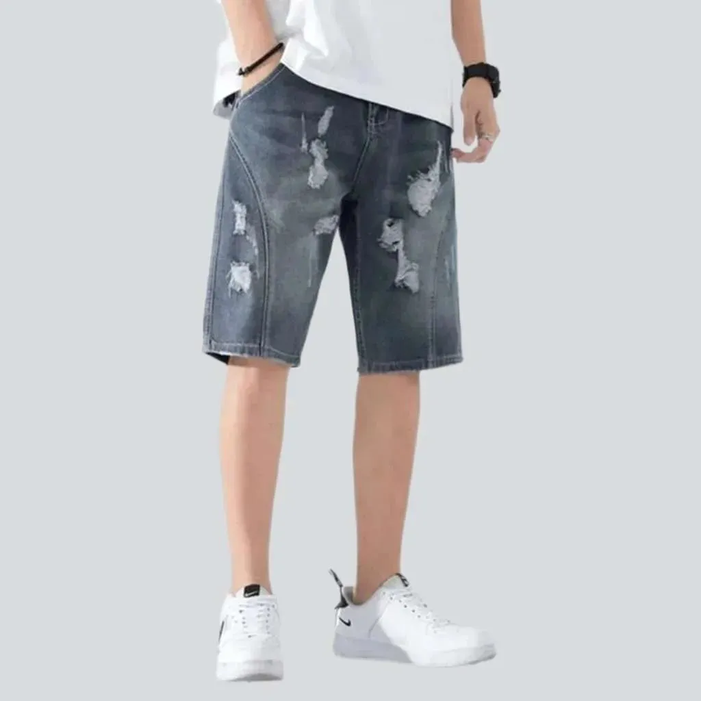 Loose men's ripped denim shorts