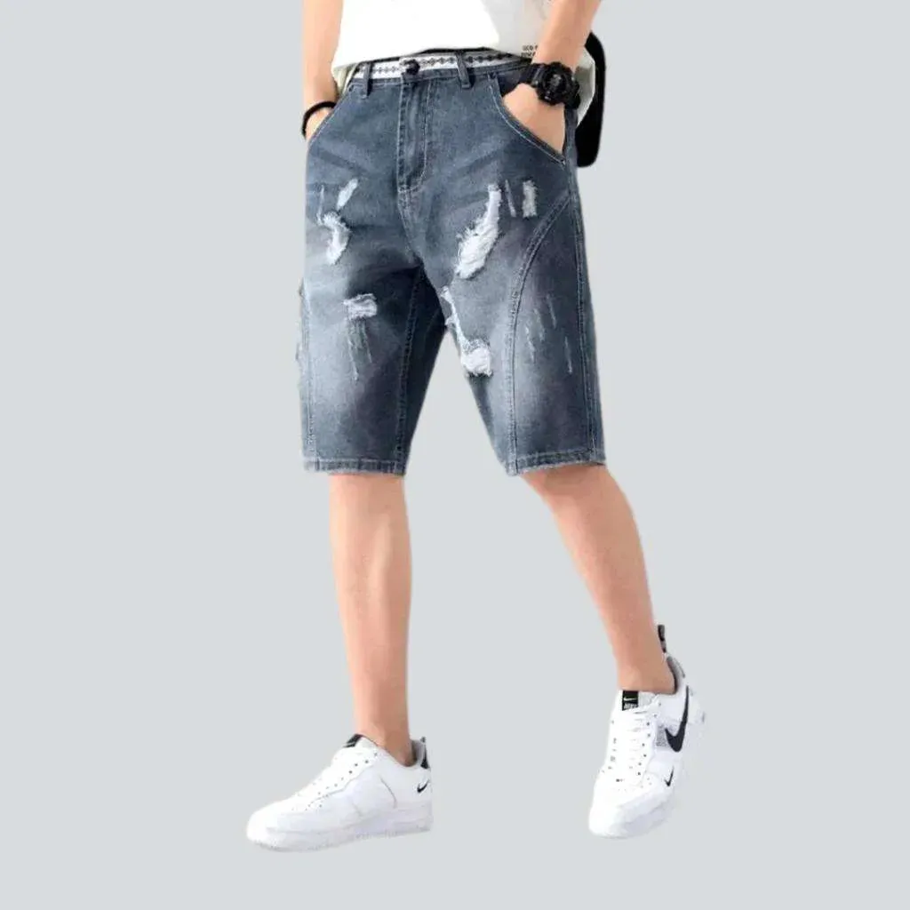 Loose men's ripped denim shorts